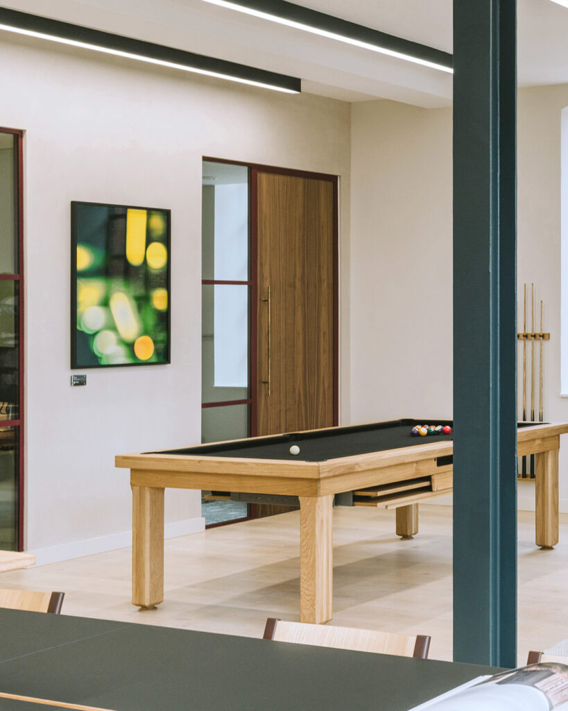 Oktra Bottleworks office space - green & yellow abstract art